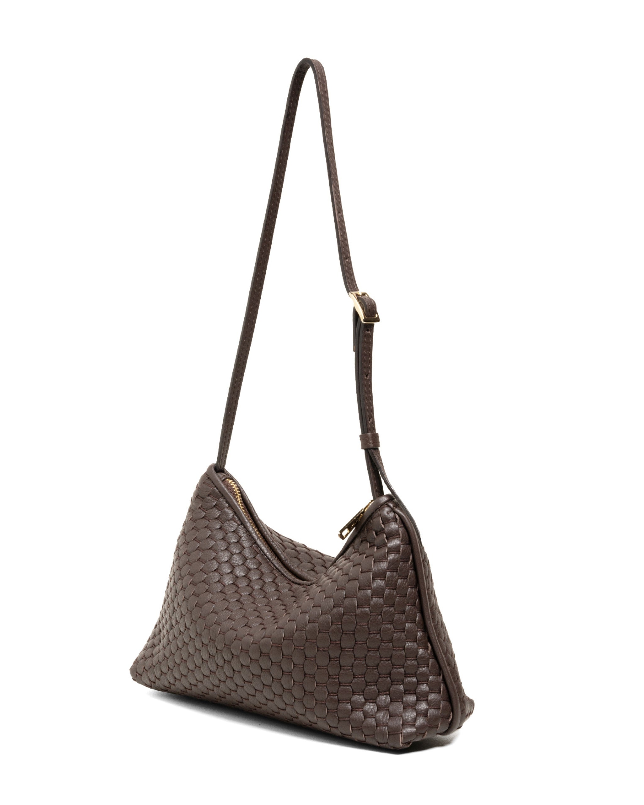 Three-quarter view of the Parise ‘81’ Baguette Bag in Ebony displaying its woven texture and slim, elongated shape