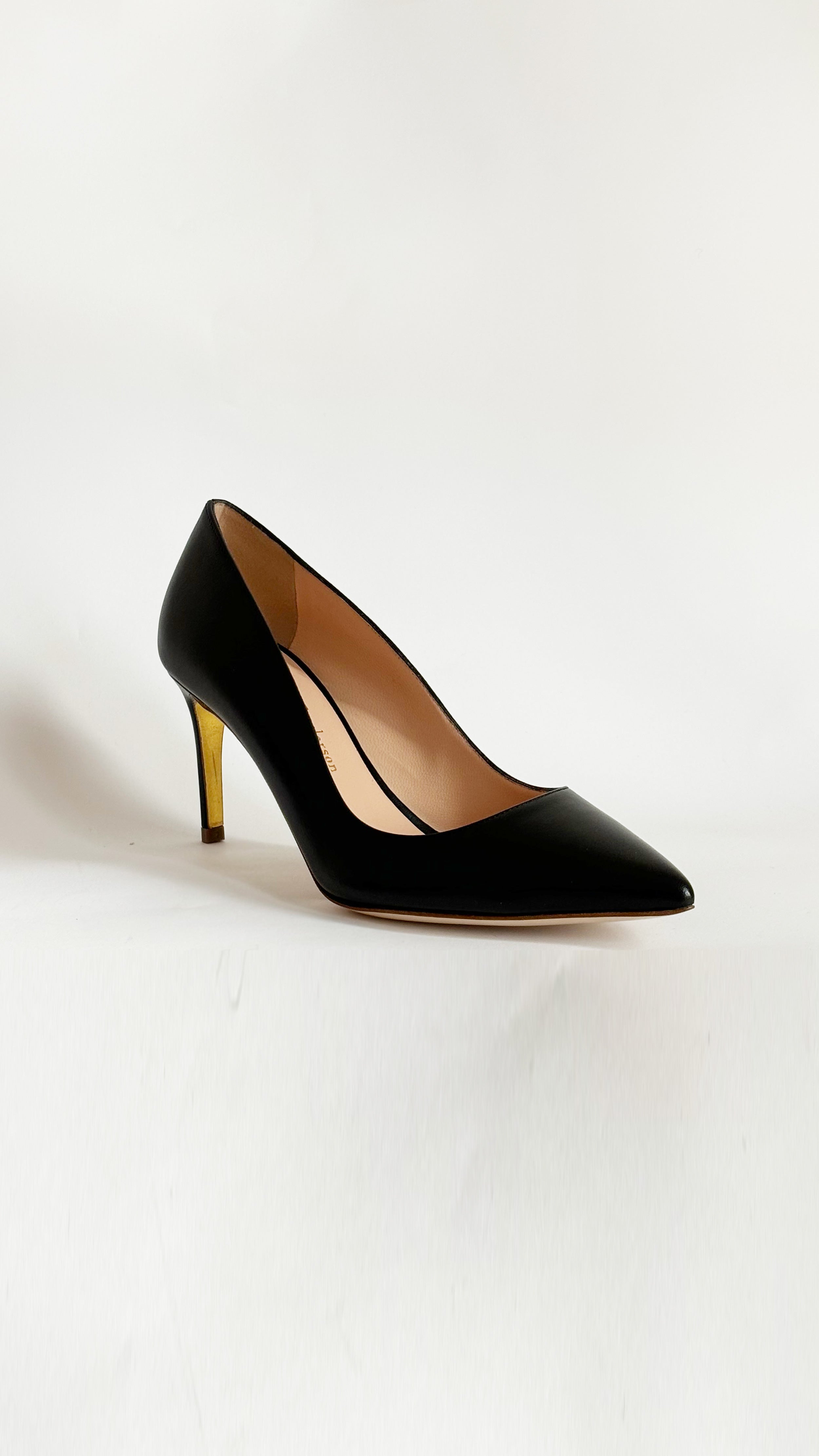 Rupert Sanderson New Nada in Black Heel, a timeless classic crafted in soft black leather. Its elegant silhouette is complemented by a slim 75mm stiletto heel. Handmade in Italy. Shown from the front and side.