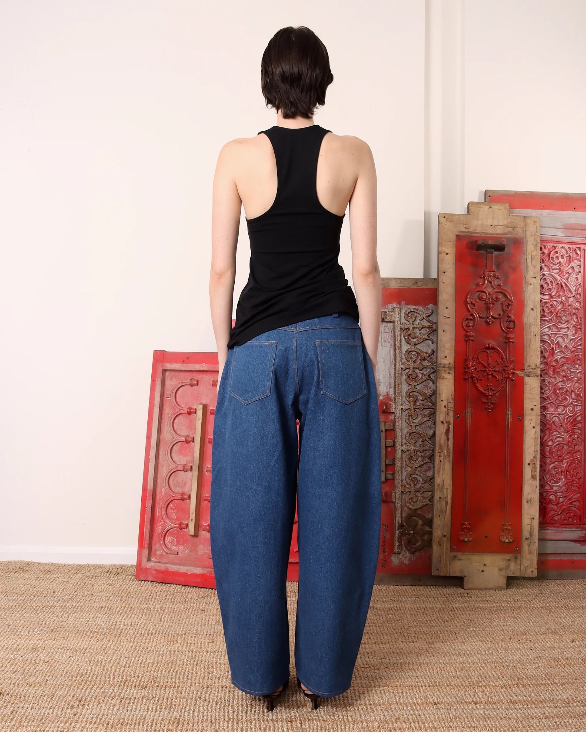 S.S. Daley wide-leg denim trousers in light blue — back view showing mid-rise cut and patch pockets.