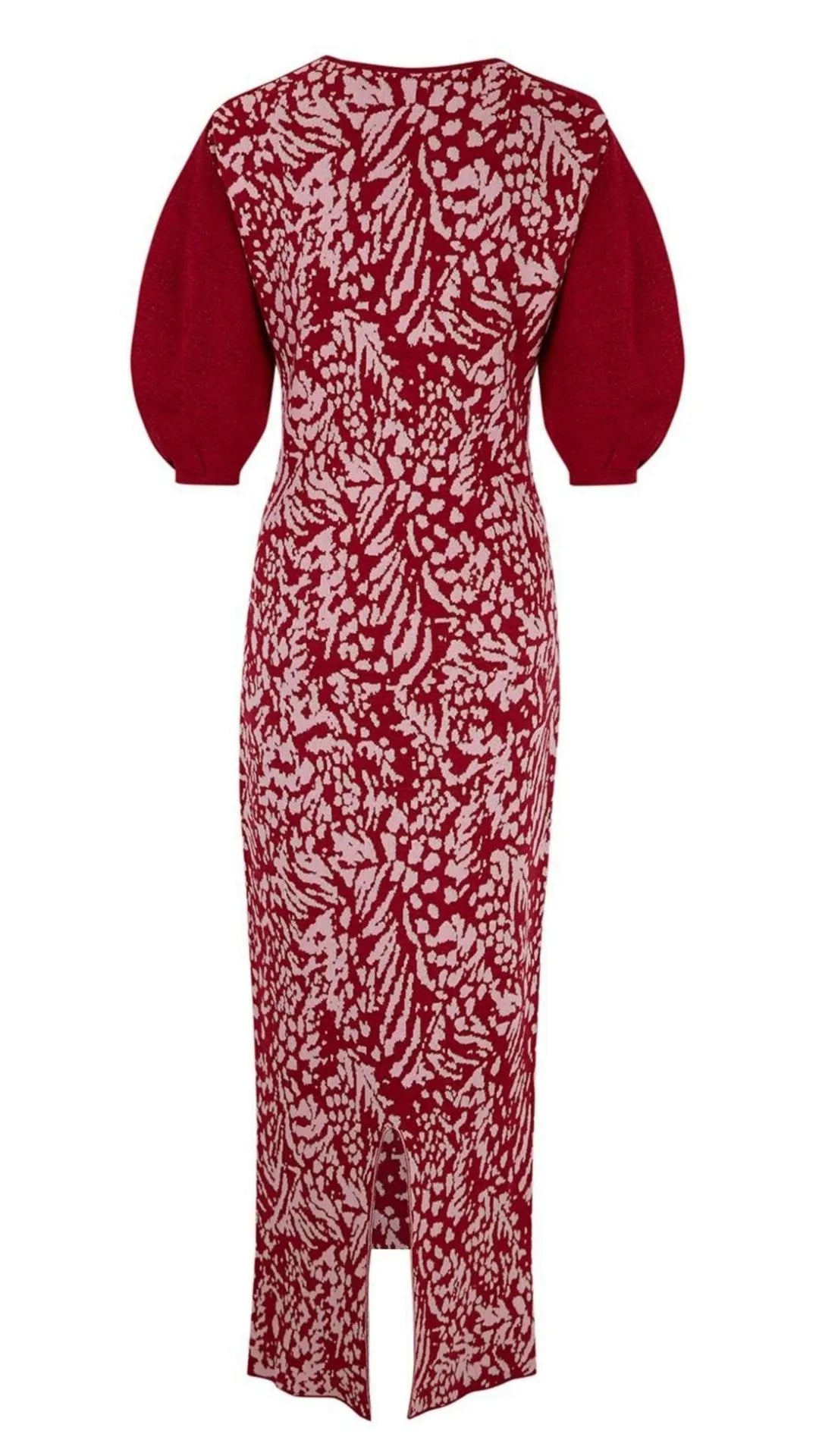 Clea Stuart Carmesi Feathers Dress. Luxury knitwear dress in burgundy and pink. The dress features mid length balloon sleeves and is midi length. There is a subtle weave of metallic threading, giving the dress an elegant look. Product photo shown from the back view.