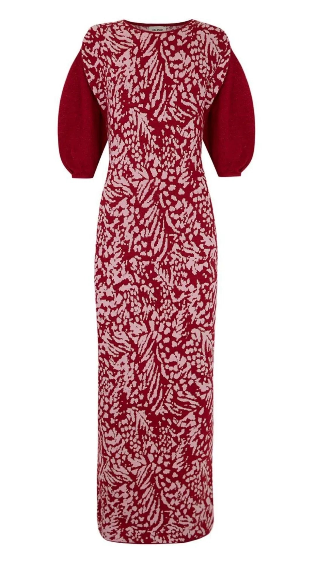 Clea Stuart Carmesi Feathers Dress. Luxury knitwear dress in burgundy and pink. The dress features mid length balloon sleeves and is midi length. There is a subtle weave of metallic threading, giving the dress an elegant look. Product photo shown from the front view.