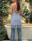 Dodo Bar Or Joe Long Top n Sky Blue. Hand crocheted in 100% cotton, this is a sleeveless style with rounded neck and low scooped back. The bottom hem is fringed. This photo shows the model wearing the blouse from the back.