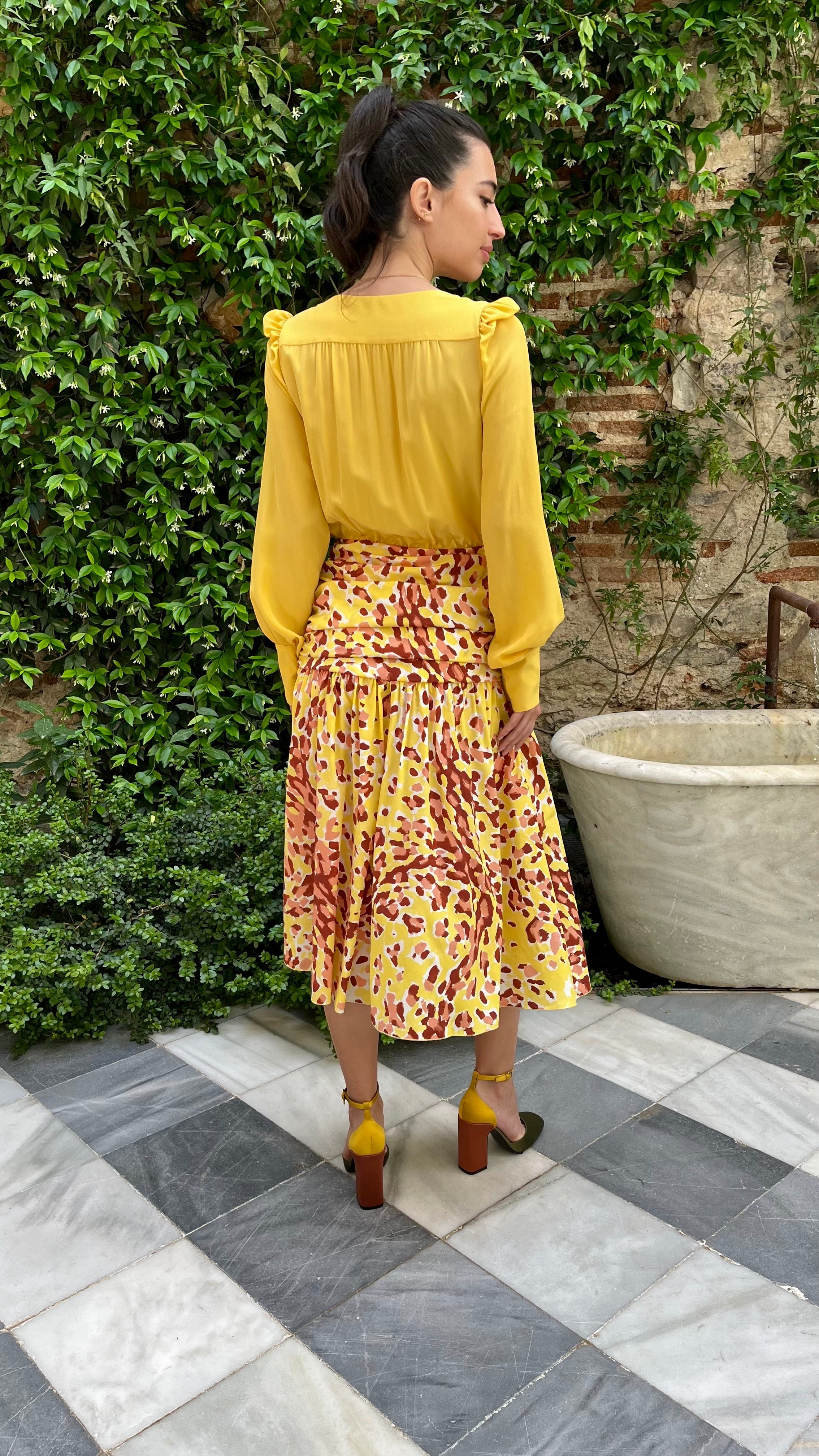 Alexandre Blanc Cowl Neck Dress Silk Yellow and Pink with leopard skirt pattern. Elegant dress for party or wedding. Midi length. Shown on model back view.