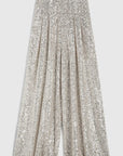 Rochas Paris Fashion High Waisted Sparkle Pants. Crafted in silver paillette sequins, they are tailored with a subtle front pleating and a fitted waist to create a slim, flattering silhouette. Product photo of the front of these trousers.