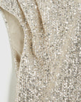 Rochas Paris Fashion Rounded Collar Sparkle Top Fitted Sleeveless Blouse with pleated shoulders in a silver sequins. Detail photo showing material and shoulder