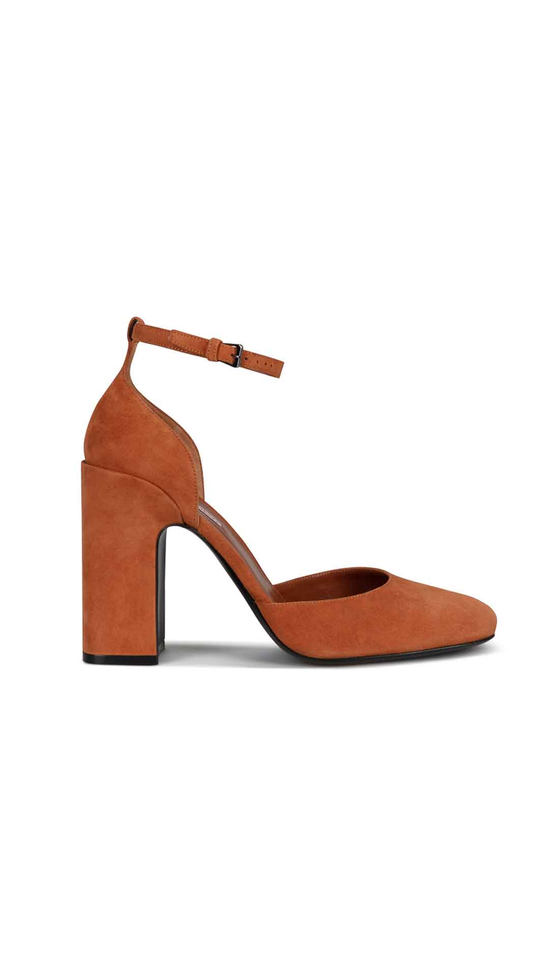 Fabrizio Viti Loren Pump High Heel Created from the most sophisticated suede, this heeled wonder in a caramel brown hue is Fabrizio&#39;s contemporary take on the classic Mary Jane. Chunky heel and suede ankle strap. Caramel color suede.