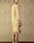 Clea Stuart silk and cotton knit. Oversized comfortable dress with turtle neck in yellow, taupe and ecru. Back view.