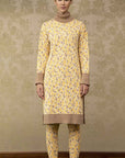 Clea Stuart silk and cotton knit. Oversized comfortable dress with turtle neck in yellow, taupe and ecru.  Front view